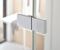 The raise-and-lower swing fitting allows the glass doors to open and close inwards and outwards